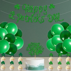 St. Patrick's Day party set with Happy Day banner, green balloons, and clover cake toppers