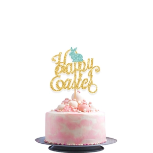 Golden glitter Happy Easter cake topper with a blue bunny on a decorative cake