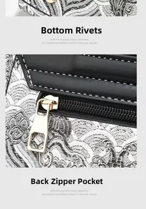 Détail de la fermeture éclair et broderie florale sur un sac de style chinois
