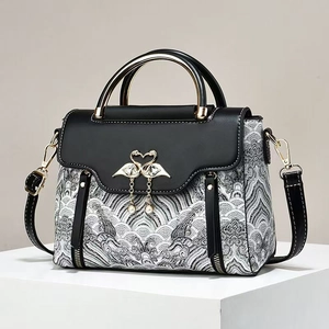 Sac à main élégant de style chinois avec broderie vagues et fermoir cygne doré