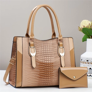 Two-piece beige tote bag set with crocodile embossed texture and shiny leather finish
