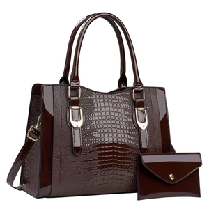 Dark brown patent leather tote bag set with crocodile pattern and gold hardware details