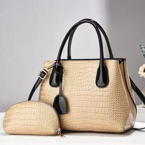 Elegant beige croc-embossed tote bag set with black patent handles and gold hardware