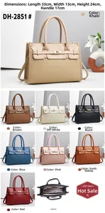 Detailed view of leather tote bag showing internal structure and dimensions of 33x13x24cm