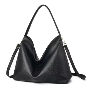 Minimalist black lychee texture tote bag with wide shoulder strap and gold hardware