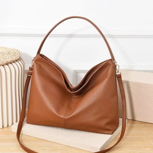 Brown litchi grain leather tote bag with dual straps and elegant gold hardware