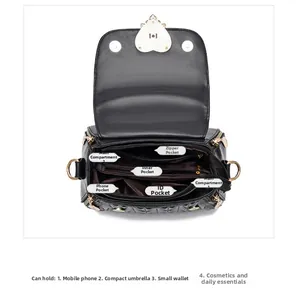 Interior layout of quilted crossbody bag with golden heart lock and functional compartments
