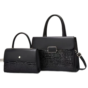 Black 2-piece tote bag set with crocodile texture and sleek matte finish on white background