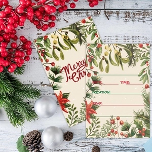 Flat lay of Christmas invitation cards with floral illustrations on white wood background