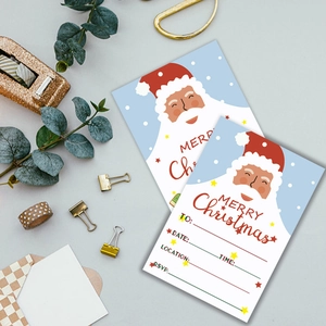 Detail of Christmas event invitations with Santa illustration on matte cardstock