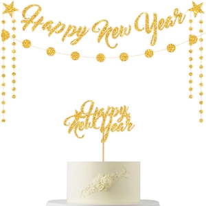 Close-up of glitter gold Happy New Year banner and matching cake topper set