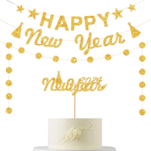 Macro shot of gold glitter Happy New Year banner and 2024 cake toppers party set