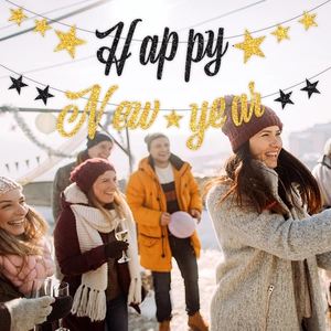 Glittering black and gold Happy New Year banner with stars for 2026 party decorations