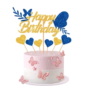 Glitter butterfly and Happy Birthday cake topper set shown on a tiered party cake