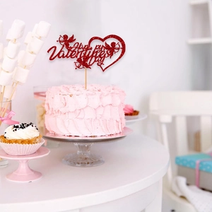 Red glitter Happy Valentine's Day cake topper with Cupid silhouette on a pink cream cake