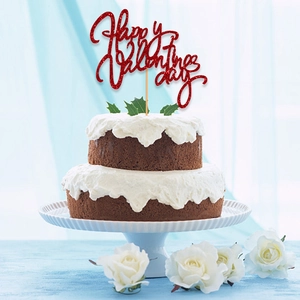 Décoration de gâteau scintillante Happy Valentine's Day rouge sur un gâteau au chocolat