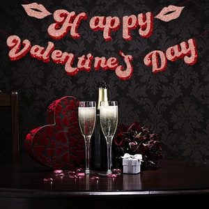 Glittery Happy Valentine's Day banner with red lips hanging over romantic dinner setup