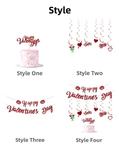 Detail of red glitter cake toppers and hanging swirls for Valentine's Day party decor