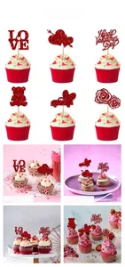 Detail of red glitter Valentine's Day cake toppers with LOVE and heart shapes
