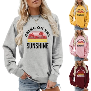 Detailed collage of colorful crewneck sweatshirts with tropical sunshine graphics