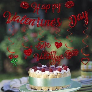 Sparkling red Happy Valentine's Day banner with heart cake toppers and spiral hanging decor