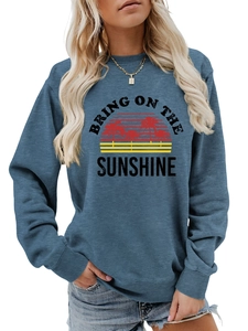 Detail of grey-blue crewneck sweatshirt featuring Bring On The Sunshine vintage print