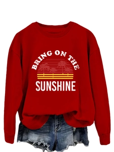 Detail view of Bring On The Sunshine graphic print on red long sleeve cotton sweatshirt