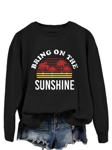 Close-up of Bring On The Sunshine vintage sunset print on black crewneck sweatshirt