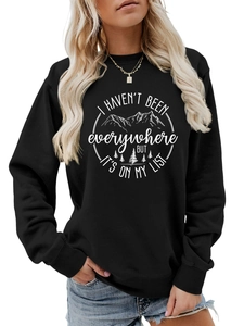 Detail of mountain print and I haven't been everywhere quote on a black sweatshirt