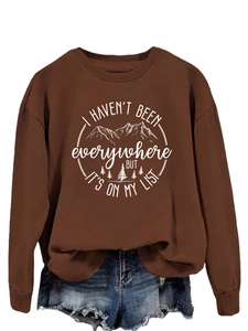 Detail of brown sweatshirt with white mountain graphic and I Haven't Been Everywhere slogan