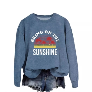Blue crewneck sweatshirt with 'Bring On The Sunshine' print and denim shorts