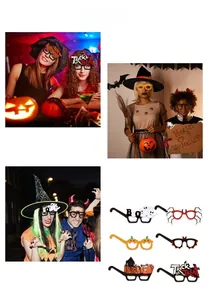 Detail of Halloween decorative paper glasses set featuring pumpkin, bat and ghost motifs