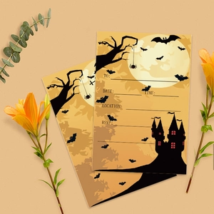 Detail of Halloween party invitations with black castle, bats, and full moon graphics