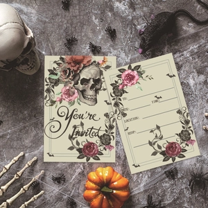 Halloween invitation cards with skull and rose motifs on dark textured background