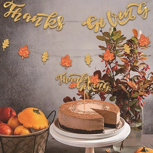 Glittery gold Thanksgiving party decoration set with maple leaf banner and cake toppers