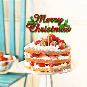 Cake topper glitterato rosso Merry Christmas con foglie di agrifoglio su torta festiva
