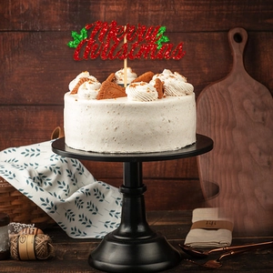 Sparkling Merry Christmas cake topper with red glitter and green holly leaves decoration