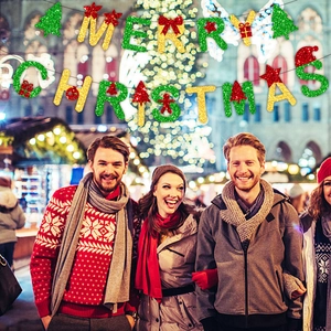 Glittery Merry Christmas banner set with festive icons in a glowing holiday market