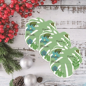 Tropical monstera leaf party invitation cards with vibrant green leaves and blue floral accents