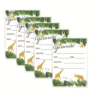Macro detail of jungle theme party invitation cards with gold animal silhouettes