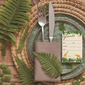 Jungle animal theme birthday party invitation card set with tropical green leaves and gold silhouettes
