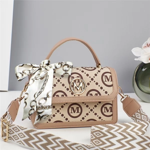 Stylish beige and khaki monogram tote bag with silk scarf and wide shoulder strap