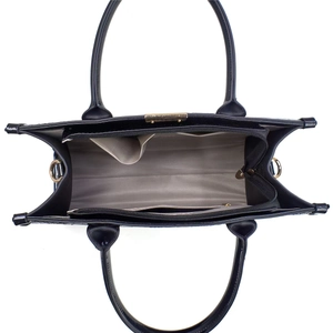 Top view of large black tote bag interior showing grey fabric lining and gold zipper