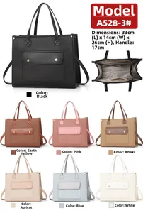 Detail view of large tote bag dimensions 33x14x26cm with internal structure and 7 colors
