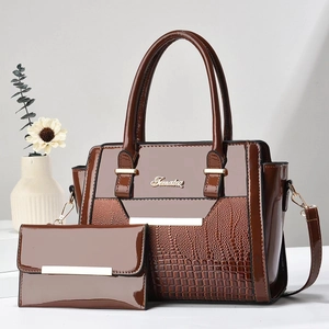 Dark brown patent leather tote with crocodile texture and matching wallet set