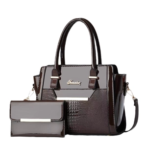 Dark brown patent leather tote bag and wallet set with glossy crocodile pattern texture
