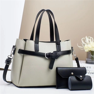Three-piece set with cream tote bag, black wallet and pouch in litchi grain leather