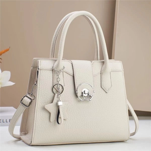 Beige lychee pattern leather handbag with silver buckle and star charm for women