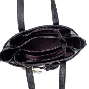 Internal structure of black pebbled leather tote with pearl detail and multi-compartments