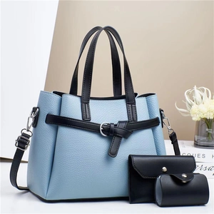 Three-piece women's handbag set featuring blue litchi leather and adjustable shoulder strap
